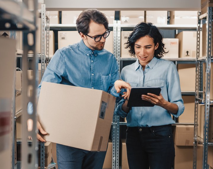 colleagues talking with ipad portrait