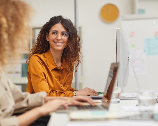 friendly woman at desk